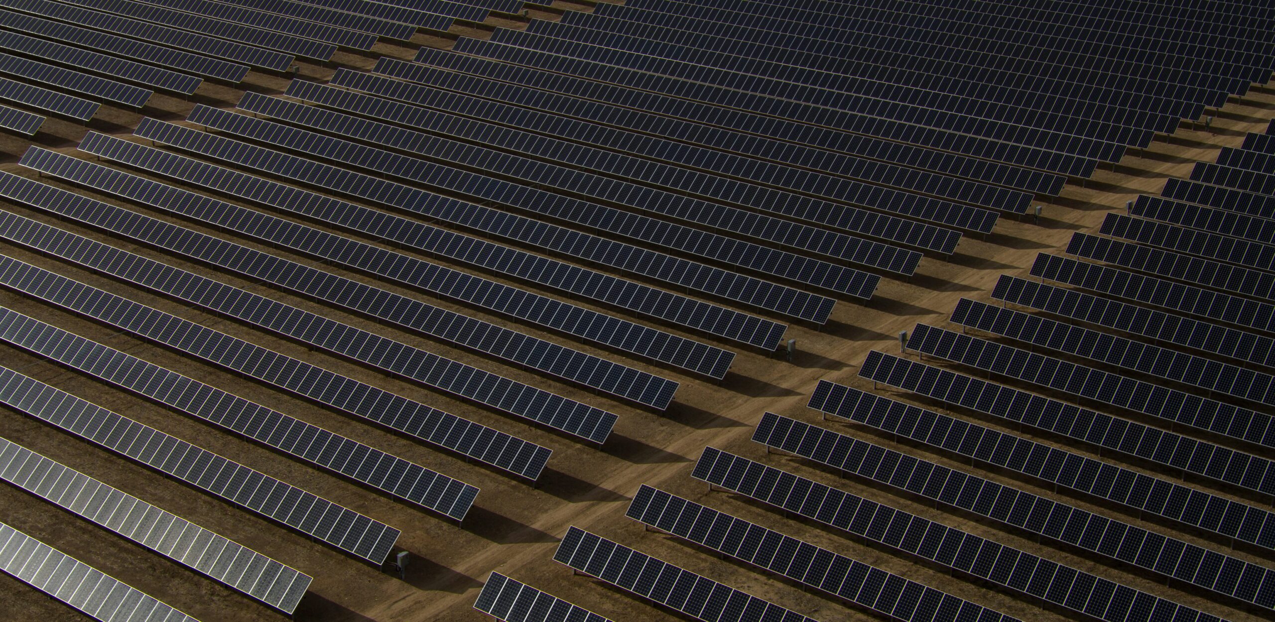 Aerial view of a utility-scale solar panel array